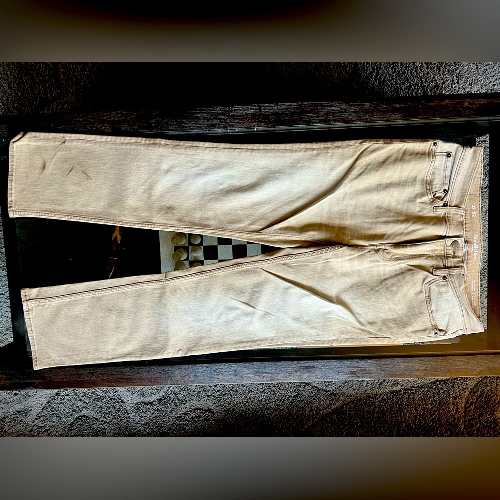 Stretchy faded tan skinny jeans